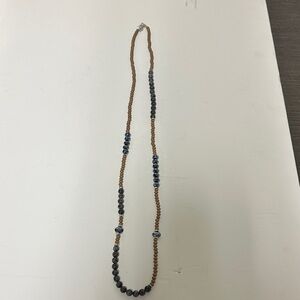 Elegant Marlyn Schiff Beaded Necklace in Brown and Charcoal with Silver accents.